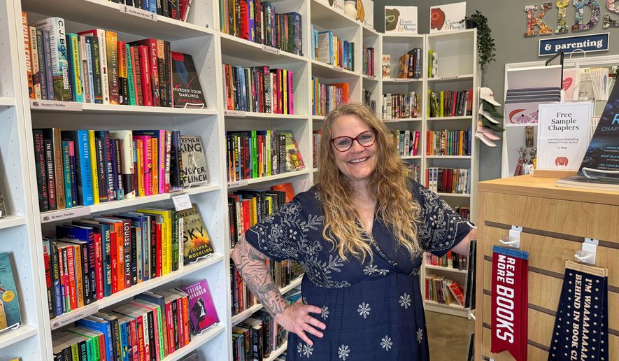 Owner Kelley Hartnett poses at her Double Dog Bookshop in Wentzville, Missouri, on Wednesday, May 27, 2026. (Photo by Bekah Ford/Double Dog Bookshop via AP)