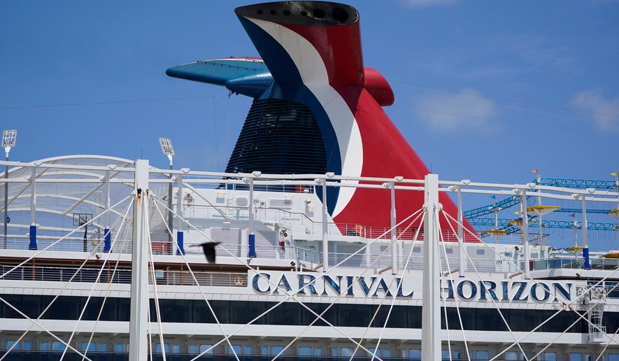 Carnival Cruise Line's Carnival Horizon cruise ship is shown docked at PortMiami, April 9, 2021, in Miami. (AP Photo/Wilfredo Lee, file)