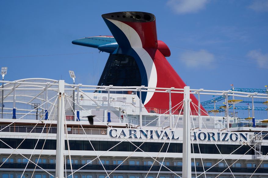 Carnival Cruise Line's Carnival Horizon cruise ship is shown docked at PortMiami, April 9, 2021, in Miami. (AP Photo/Wilfredo Lee, file)