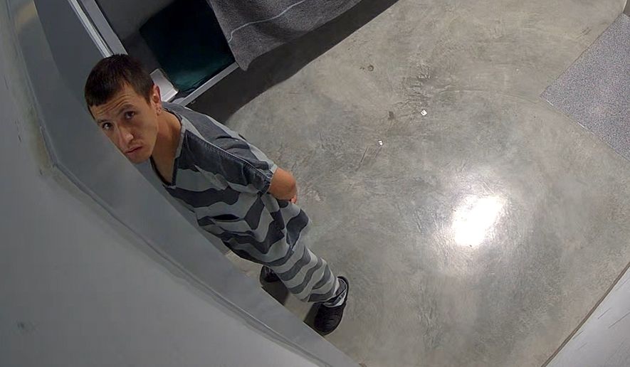 In this image from video provided by the Missouri State Highway Patrol, Immigration and Customs Enforcement detainee Brayan Rayo Garzon looks towards a surveillance camera in the Phelps County jail in Rolla, Mo., on April 7, 2025, shortly before he died by suicide. (Missouri State Highway Patrol via AP)