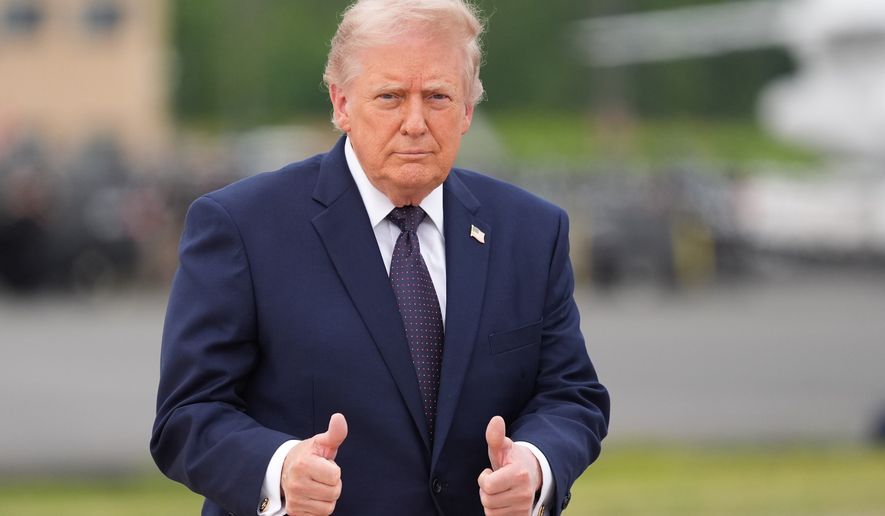 President Donald Trump walks from Marine One to board Air Force One at Morristown Airport, Friday, May 22, 2026, in Morristown, N.J. (AP Photo/Alex Brandon)