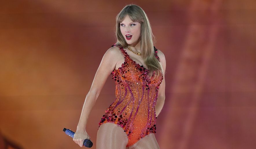 Taylor Swift performs at the Paris Le Defense Arena during her Eras Tour concert in Paris, May 9, 2024. (AP Photo/Lewis Joly, File)