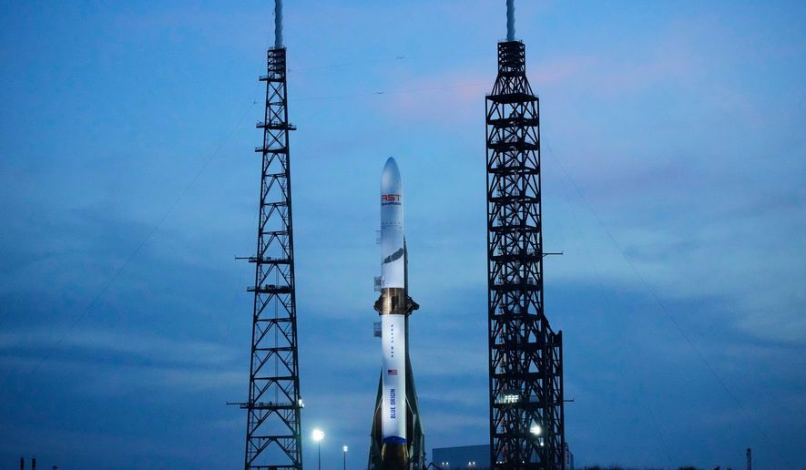 A Blue Origin New Glenn rocket stands ready for launch at the Cape Canaveral Space Force station in Cape Canaveral, Fla., April 18, 2026. (AP Photo/John Raoux, File)