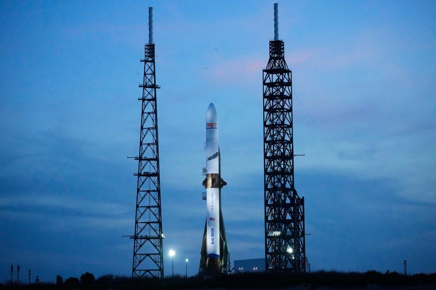 A Blue Origin New Glenn rocket stands ready for launch at the Cape Canaveral Space Force station in Cape Canaveral, Fla., April 18, 2026. (AP Photo/John Raoux, File)