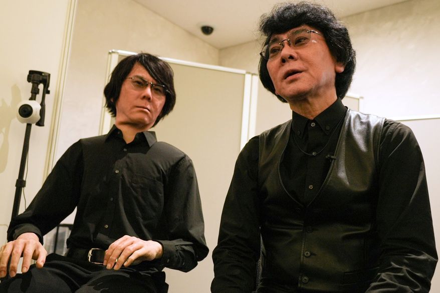 Professor Hiroshi Ishiguro, right, of Osaka University talks to android robot Geminoid at the Humanoids Summit 2026 in Tokyo, Thursday, May 28, 2026. (AP Photo/Ayaka McGill)