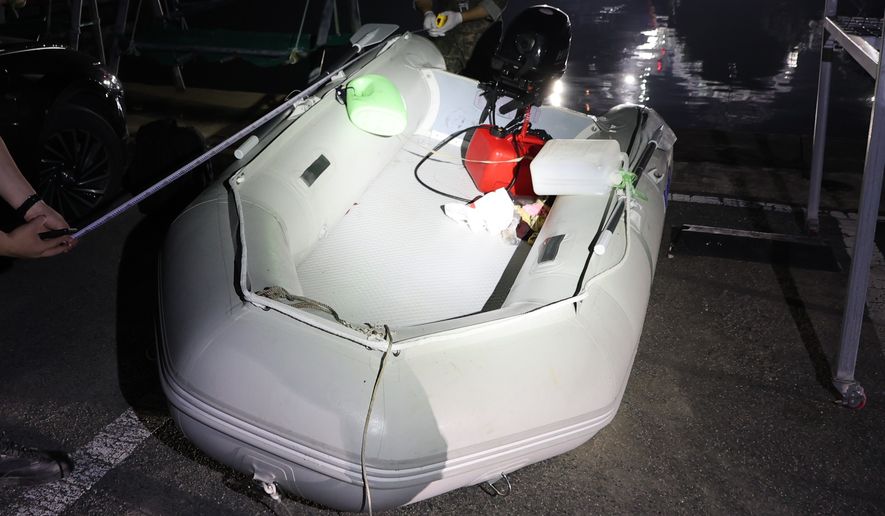 This photo provided by The Taean Maritime Police, shows the rubber boat that a Chinese national had boarded when he was detained in the waters off South Korea's west coast, at a port in Taean, South Korea, Tuesday, May 26, 2026. (The Taean Maritime Police/ via AP)