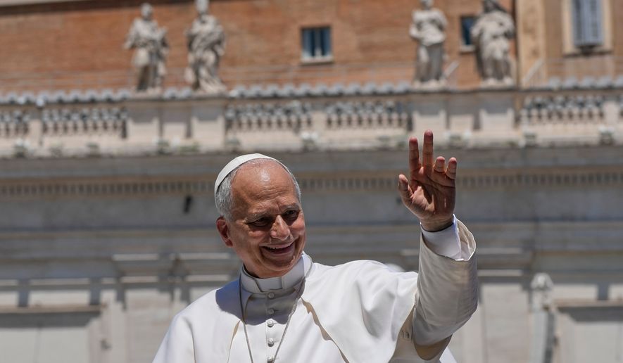 Pope Leo XIV waves as he leaves after his weekly general audience in St. Peter's Square at The Vatican, Wednesday, May 27, 2026. (AP Photo/Alessandra Tarantino)