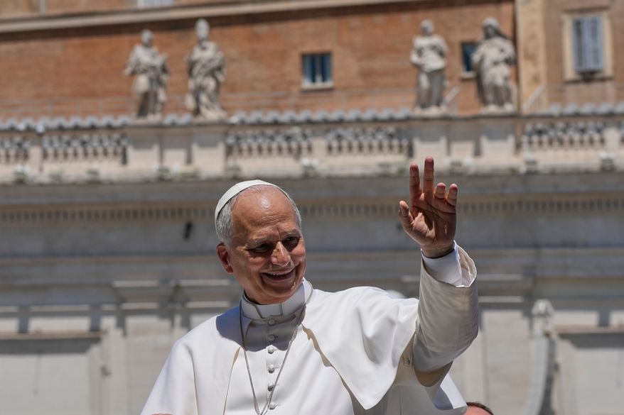 Pope Leo XIV waves as he leaves after his weekly general audience in St. Peter's Square at The Vatican, Wednesday, May 27, 2026. (AP Photo/Alessandra Tarantino)