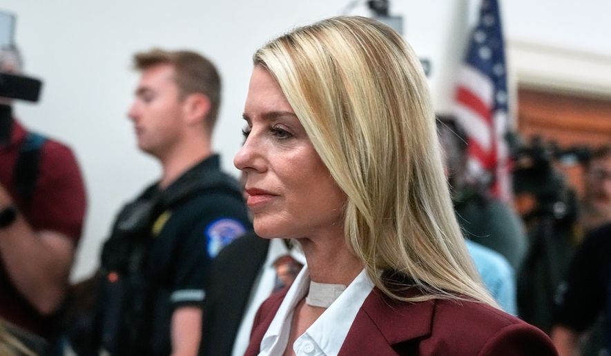Former Attorney General Pam Bondi arrives for her deposition at the Rayburn House Office Building on Capitol Hill, Friday, May 29, 2026, in Washington. (AP Photo/Manuel Ceneta)