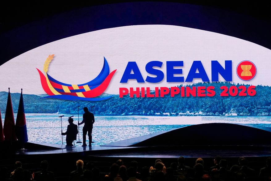Workers arrange microphones on the stage before the start of the opening ceremony of the 48th ASEAN summit and related meetings in Cebu, Philippines, May 8, 2026. (AP Photo/Aaron Favila, Pool, File)