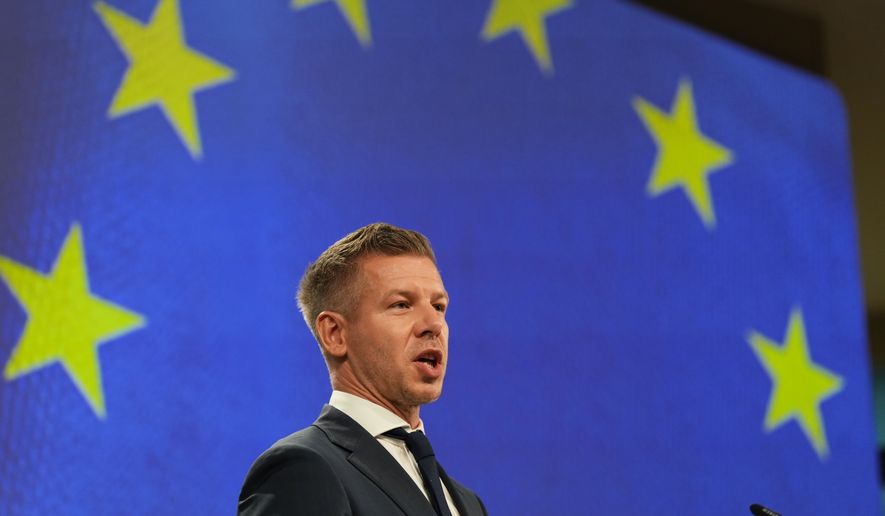 Hungary's Prime Minister Peter Magyar addresses the media at EU headquarters in Brussels, Friday, May 29, 2026. (AP Photo/Virginia Mayo)