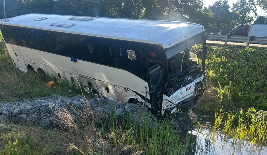 This photo, provided by the Virginia State Police, shows the scene of a fatal accident involving a passenger bus on Interstate 95 in near Quantico, Va., on Friday, May 29, 2026. (Virginia State Police via AP)