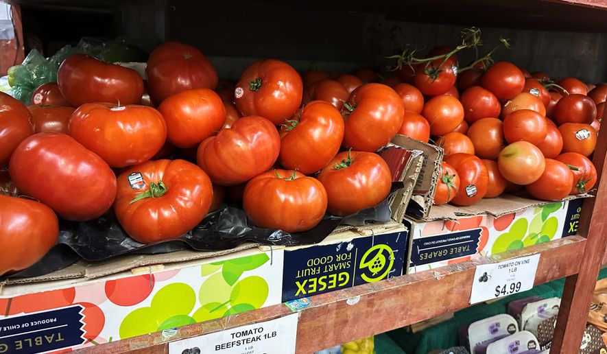 Tomatoes await customers on the shelves of a supermarket in New York on Tuesday, May 26, 2026. (AP Photo/Matt Sedensky)