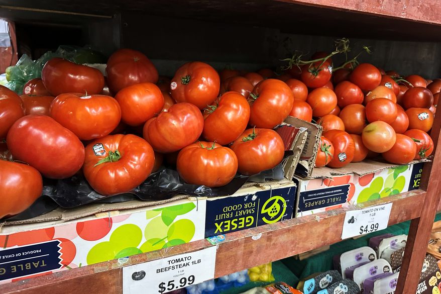 Tomatoes await customers on the shelves of a supermarket in New York on Tuesday, May 26, 2026. (AP Photo/Matt Sedensky)