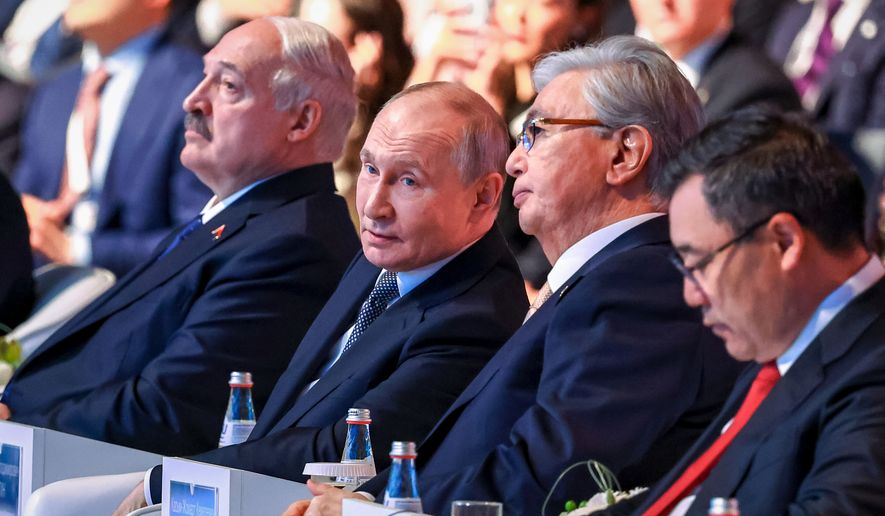 Front from left: Belarusian President Alexander Lukashenko, Russian President Vladimir Putin, Kazakhstan's President Kassym-Jomart Tokayev, and Kyrgyztan's President Sadyr Zhaparov attend a plenary session of the Eurasian Economic Forum in Astana, Kazakhstan, Thursday, May 28, 2026. (Alexander Kazakov/Sputnik, Kremlin Pool Photo via AP)