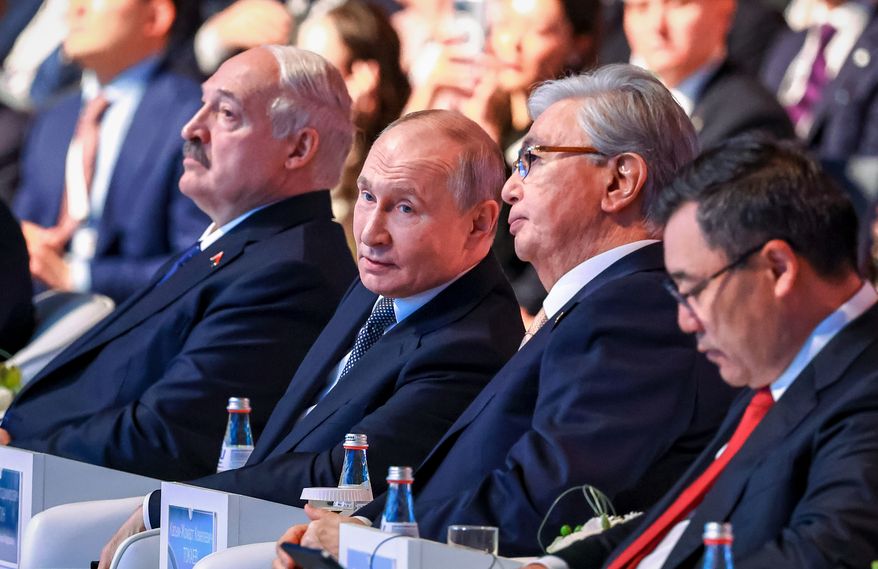Front from left: Belarusian President Alexander Lukashenko, Russian President Vladimir Putin, Kazakhstan's President Kassym-Jomart Tokayev, and Kyrgyztan's President Sadyr Zhaparov attend a plenary session of the Eurasian Economic Forum in Astana, Kazakhstan, Thursday, May 28, 2026. (Alexander Kazakov/Sputnik, Kremlin Pool Photo via AP)