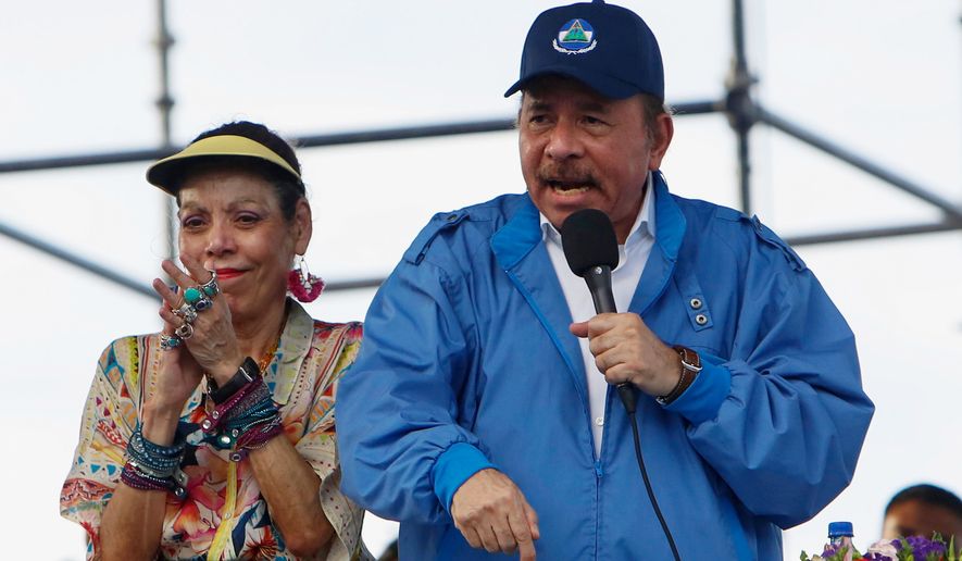 Nicaragua's President Daniel Ortega speaks to supporters as his wife and Vice President Rosario Murillo applauds, in Managua, Nicaragua, Aug. 29, 2018. (AP Photo/Alfredo Zuniga, File)