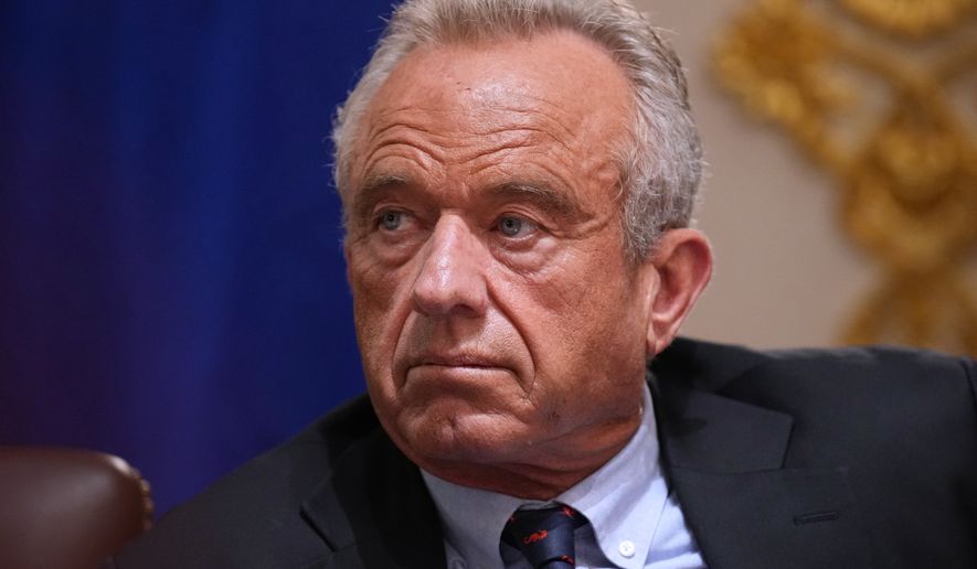 Secretary of Health and Human Services Robert F. Kennedy Jr., listens during a Cabinet meeting at the White House, Wednesday, May 27, 2026, in Washington. (AP Photo/Jacquelyn Martin)