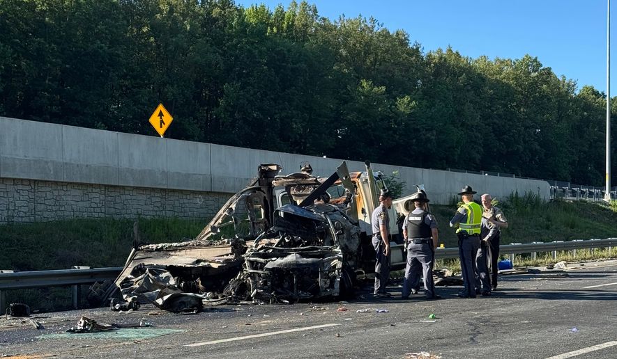 This photo provided by the Virginia State Police, shows the scene of a fatal accident involving a bus on Interstate 95 near Quantico, Va., on Friday, May 29, 2026. (Virginia State Police via AP)