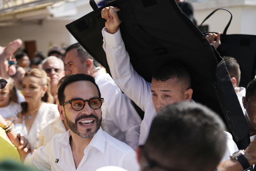 Presidential candidate Abelardo de la Espriella of the Defenders of the Motherland movement departs a polling station after voting during the presidential election in Barranquilla, Colombia, Sunday, May 31, 2026. (AP Photo/Ivan Valencia)