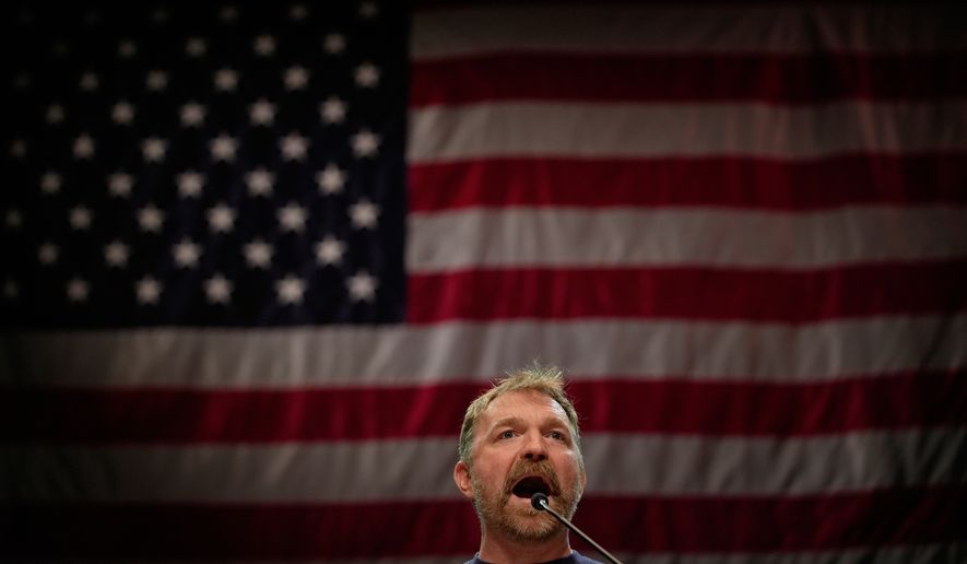 Graham Platner, Democratic candidate for U.S. Senate, speaks at an event hosted by Sen. Bernie Sanders in Orono, Maine, Sunday, May 24, 2026. (AP Photo/Robert F. Bukaty)