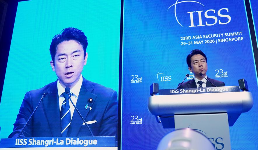 Japan's Defense Minister Shinjiro Koizumi delivers a speech during the Shangri-La Dialogue, Asia's annual defense and security forum, in Singapore, Sunday, May 31, 2026. (AP Photo/Achmad Ibrahim)