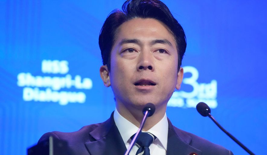 Japan's Defense Minister Shinjiro Koizumi delivers a speech during the Shangri-La Dialogue, Asia's annual defense and security forum, in Singapore, Sunday, May 31, 2026. (AP Photo/Achmad Ibrahim)