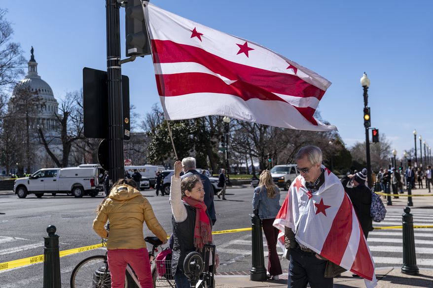 Advocates for District of Columbia statehood stage a rally and arrest event at the Capitol in Washington, Wednesday, March 8, 2023. (AP Photo/J. Scott Applewhite) **FILE**