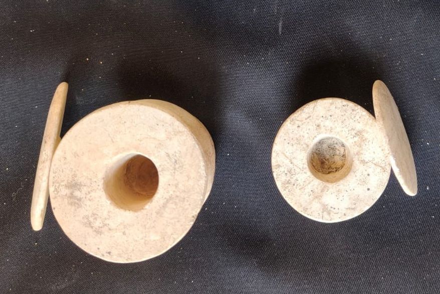 In this photo provided by Ministry of Tourism and Antiquities, recently unearthed ancient artifacts are displayed on May 31, 2026, in Ehnasiya district in Beni Suef, 130 kilometers (80 miles) south of Cairo, Egypt. (Ministry of Tourism and Antiquities via AP)