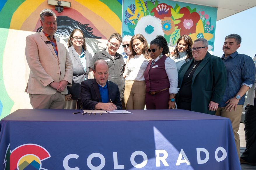 Colorado Gov. Jared Polis signed House Bill 1322 on June 1, 2026, a law creating a civil cause of action for those harmed by conversion therapy aimed at changing their sexual orientation or gender identity. (Governor's office photo)