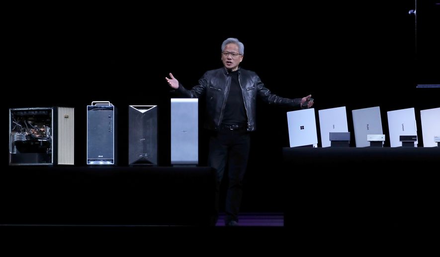 Nvidia CEO Jensen Huang delivers a speech during the Computex 2026 exhibition in Taipei, Taiwan, Monday, June 1, 2026. (AP Photo/Chiang Ying-ying)