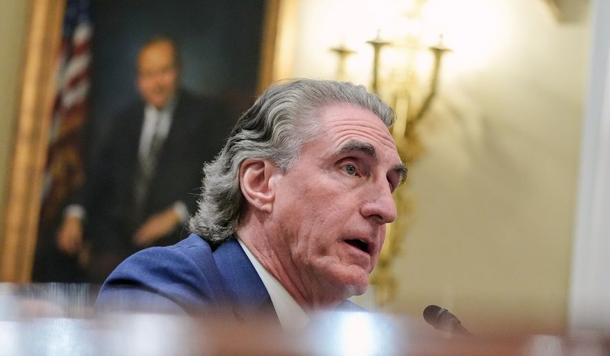 Interior Secretary Doug Burgum testifies during the House National Resources Committee on the budget request for the Interior Department on Capitol Hill, Wednesday, May 13, 2026, in Washington. (AP Photo/Mariam Zuhaib)