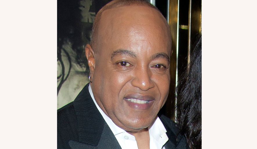 Peabo Bryson smiles at the European premiere of "Michael Jackson: The Life Of An Icon," in London, Nov. 2, 2011. (AP Photo/Joel Ryan, File)