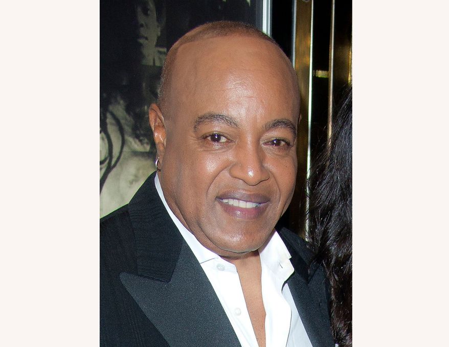 Peabo Bryson smiles at the European premiere of "Michael Jackson: The Life Of An Icon," in London, Nov. 2, 2011. (AP Photo/Joel Ryan, File)
