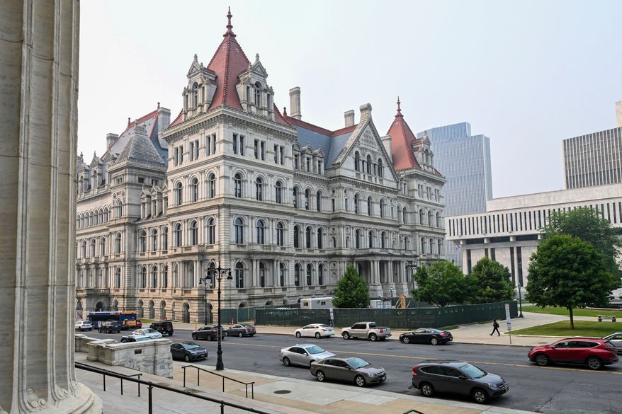 The New York state Capitol is seen from the steps of the State Education Building in Albany, N.Y., June 7, 2023. (AP Photo/Hans Pennink, File)