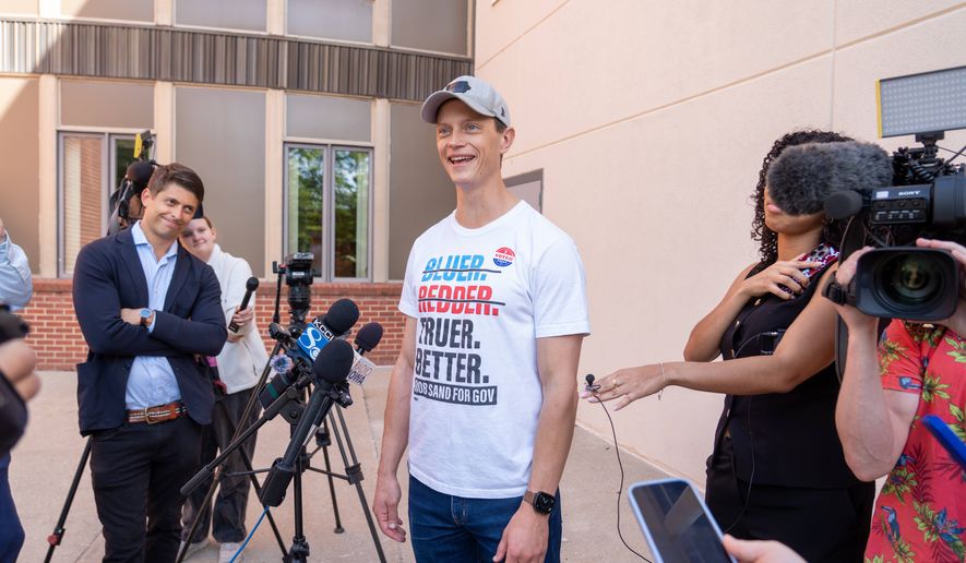 Iowa democratic gubernatorial candidate Rob Sand speaks to media after voting on primary Election Day, Tuesday, June 2, 2026, in Des Moines, Iowa. (AP Photo/Bryon Houlgrave)