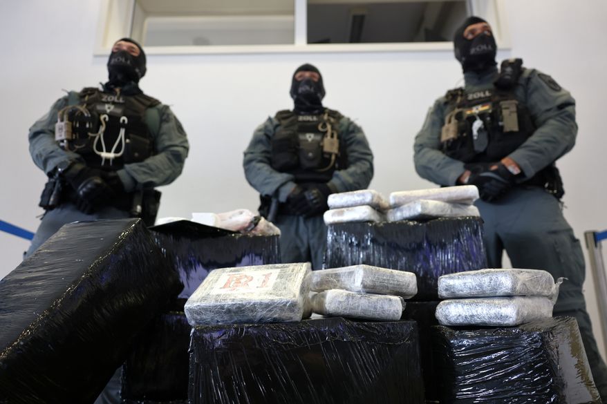 Several bags of cocaine that were seized by German customs are seen at a press conference at the Customs Criminal Investigation Office in Cologne, Germany, Wednesday, June 3, 2026. (Rolf Vennenbernd/dpa via AP)