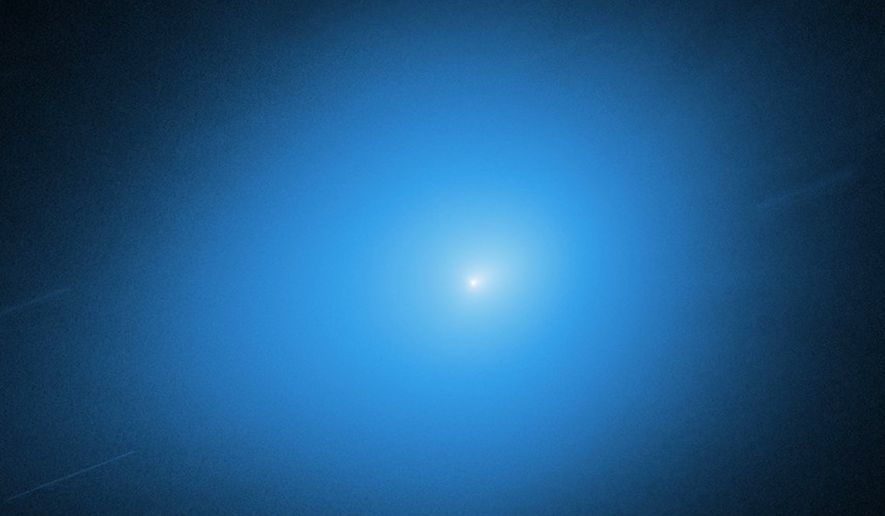 This image provided by NASA shows the interstellar comet 3I/Atlas captured by the Hubble Space Telescope on Nov. 30, 2025. (NASA, ESA, STScI, D. Jewitt (UCLA), M.-T. Hui (Shanghai Astronomical Observatory), J. DePasquale (STScI) via AP, File)