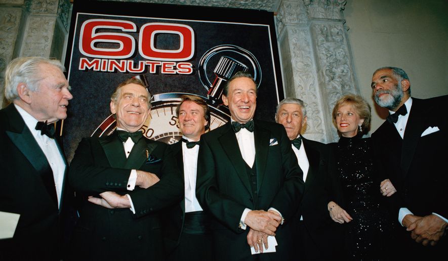 The "60 Minutes" team, from left, Andy Rooney, Morley Safer, Steve Kroft, Mike Wallace, executive producer Don Hewitt, Lesley Stahl, and Ed Bradley pose at the Metropolitan Museum of Art in New York celebrating their 25th anniversary, on Nov. 10, 1993. (AP Photo/Mark Lennihan, File)