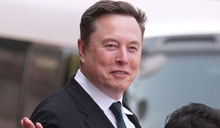 Elon Musk departs after a welcome ceremony with President Donald Trump and China's President Xi Jinping at the Great Hall of the People, Thursday, May 14, 2026, in Beijing. (AP Photo/Mark Schiefelbein, File)