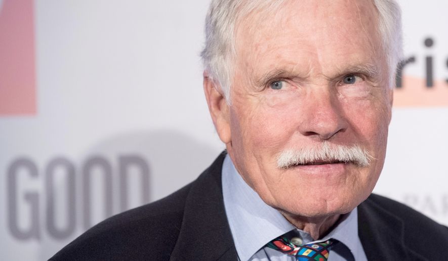 FILE - U.S. media mogul Ted Turner poses for the photographers as he arrives prior to a dinner at the US Ambassador's residence in Paris, Dec. 8, 2015. (AP Photo/Kamil Zihnioglu, File)