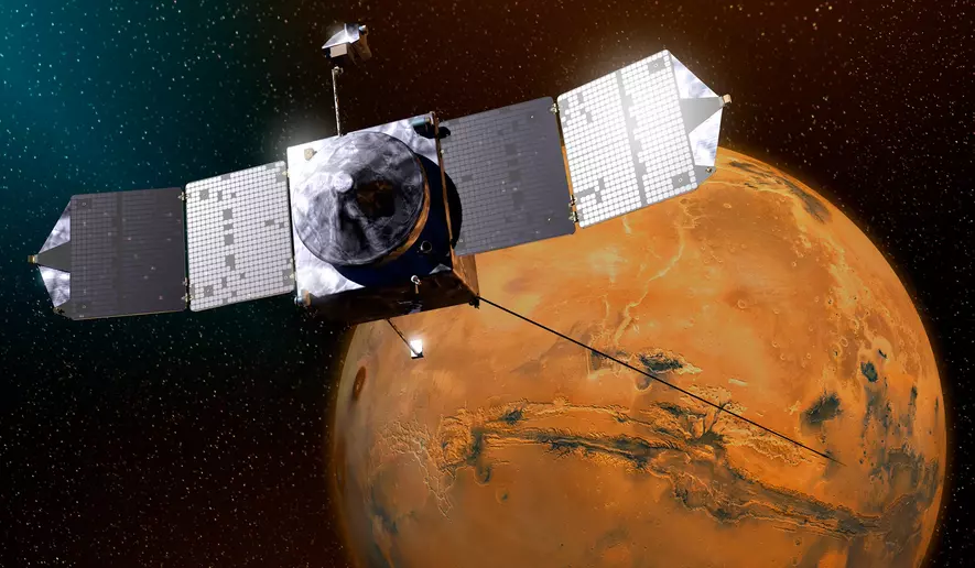 Artist’s concept of NASA’s MAVEN spacecraft at Mars. The spacecraft entered orbit around the planet in 2014 and has completed over eleven years of observing the Martian upper atmosphere, ionosphere, and interactions with the Sun and solar wind to explore the loss of the Red Planet’s atmosphere to space.
(Photo and caption credit: NASA/Goddard/University of Colorado/Laboratory for Atmospheric and Space Physics)