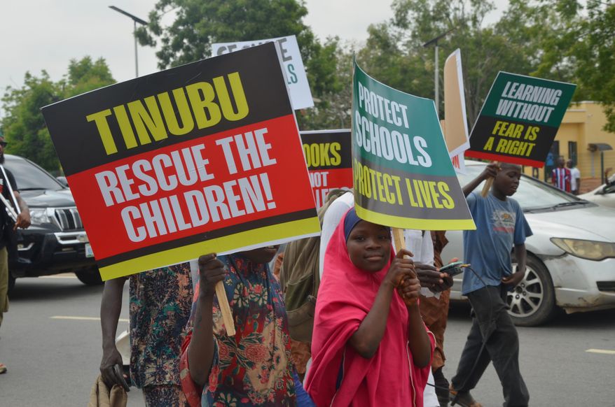Children protest demanding government to rescue the school children who were recently kidnapped in various part of the country, on the street of Abuja, Nigeria. Thursday, June 4, 2026. (AP Photo/Olamikan Gbemiga)