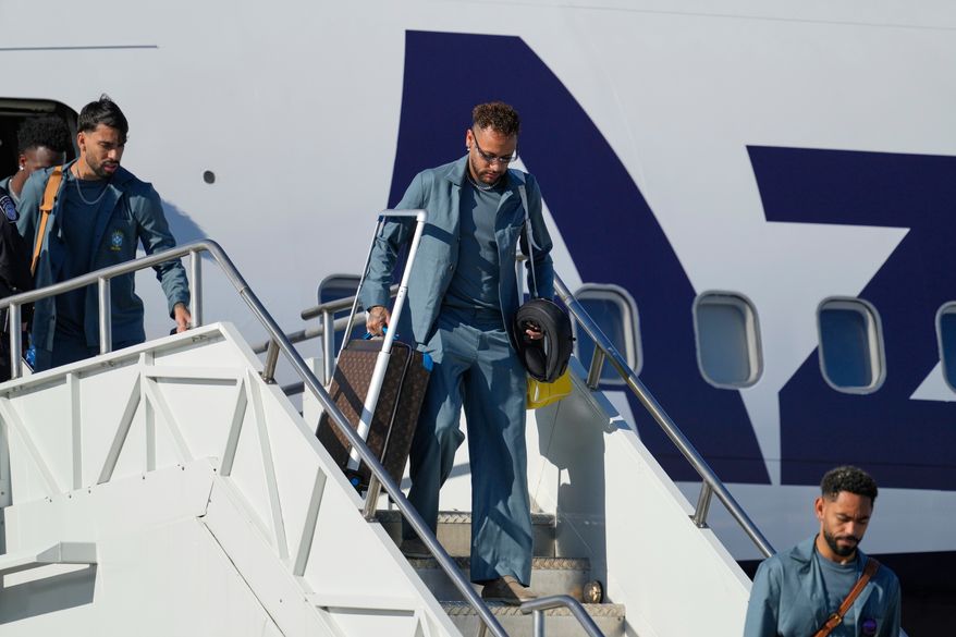Brazilian soccer player Neymar disembarks at Newark Liberty International Airport in Newark, N.J., Tuesday, June 2, 2026, as the team arrives ahead of the World Cup soccer tournament. (AP Photo/Seth Wenig)
