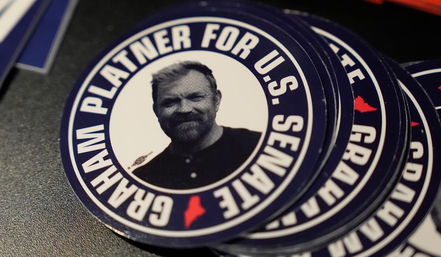 Stickers for Graham Platner, Democratic candidate for U.S. Senate, are displayed at campaign event Friday, June 5, 2026, in Bar Harbor, Maine. (AP Photo/Robert F. Bukaty)