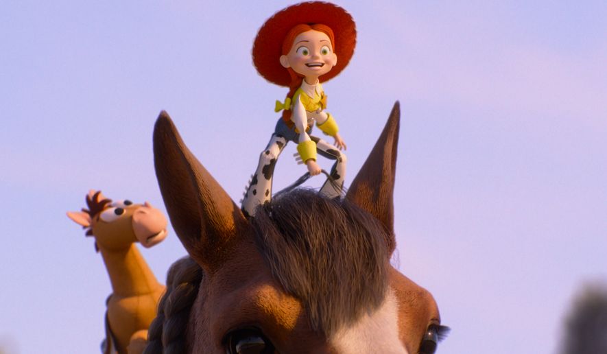This image released by Pixar shows the characters Bullseye and Jessie, voiced by Joan Cusack, center, in a scene from "Toy Story 5." (Pixar-Disney via AP)