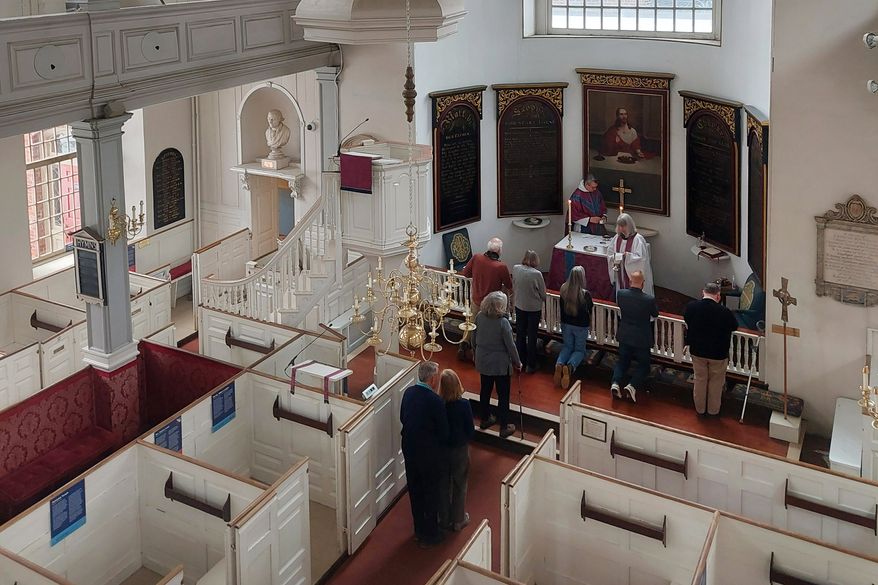 This photo provided by Religion News Service shows congregants receiving communion during an Ash Wednesday service on Feb. 18, 2026, at Old North Church in Boston. (RNS photo/Adelle M. Banks)