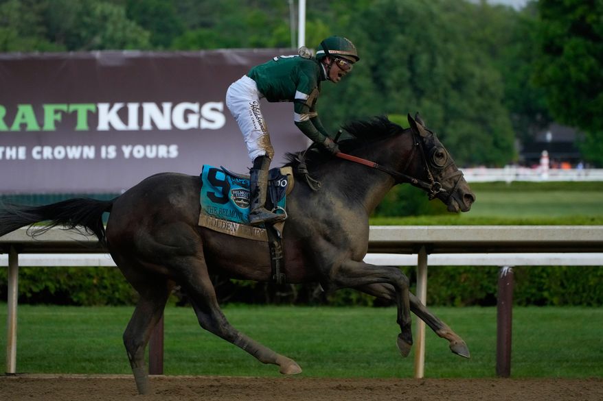 Golden Tempo (9) with Jockey Jose Ortiz crosses the finish line to win the 158th running of the Belmont Stakes horse race, Saturday, June 6, 2026, in Saratoga Springs, N.Y. (AP Photo/Yuki Iwamura)