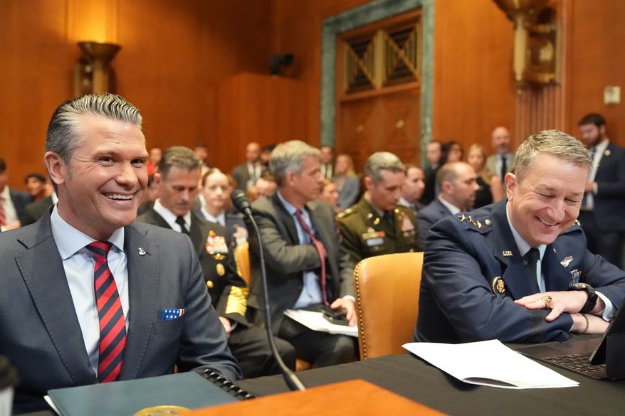 Defense Secretary Pete Hegseth and Chairman of the Joint Chiefs of Staff Gen. Dan Caine arrive for a Senate Appropriations subcommittee on defense hearing on the budget request for the Department of Defense, Tuesday, May 12, 2026, in Washington. (AP Photo/Alex Brandon)