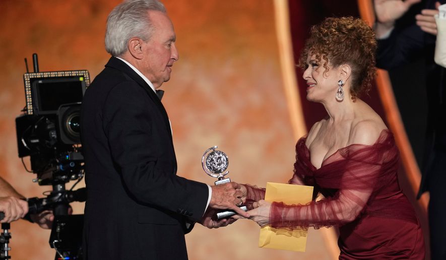 Bernadette Peters, left, presents the award for best musical to Lorne Michaels for "Schmigadoon!" during the 79th Tony Awards on Sunday, June 7, 2026, at Radio City Music Hall in New York. (Photo by Charles Sykes/Invision/AP)